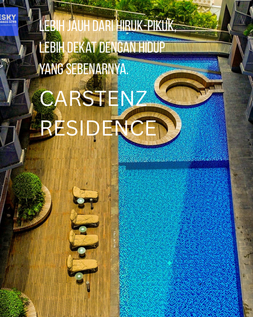 Pemandangan udara kolam renang Carstenz Residence dengan desain modern dikelilingi area hijau dan bangunan residensial, menampilkan suasana tenang dan eksklusif sebagai simbol keseimbangan hidup di kawasan urban baru.